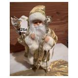 18 inch Santa dolled up in gold and jewels, going to see the Queen of England