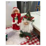 Lighted caroling girl plays music and moves w/wooden Christmas tree w/ Santa face