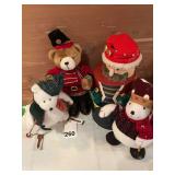 2 white Christmas bears and a trumpet playing bear