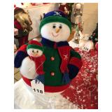 Jolly Momma Snowman and baby all dressed up for cold weather