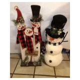 3 wooden snowmen with one that is 20-inch vintage