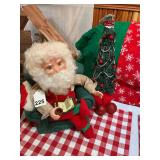 Santa resting in his chair w/ custom cloth Christmas tree and reading his Christmas list and he moves.