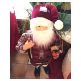 36-inch Santa dressed up in his carpenter’s outfit from working in his woodshop