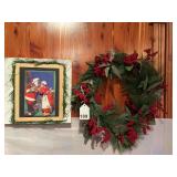 3D hand crafted picture of Mr. and Mrs. Clause, with a modern store bought wreath.