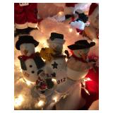 3 Vintage snowmen with small Santa figurine