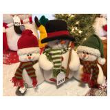 3 Snowmen- Dad, Mom and Son been playing snowball hockey