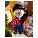 This is a Vintage Snowman entertainer that sings jazzy Christmas songs