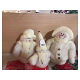 Another family of Snowmen that are stuffed and real nice cloth clothing