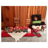 3 glass Christmas trains, and a Snowman face door knob hanger