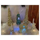 Nice large lot that contains 2-22 inch gold trees, Manger scene, Lighted gold ball, and an Exceptional lighted white ceramic 16 inch angel with lights flashing, which goes with the lot.