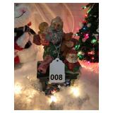 Wooden Santa with small figurines