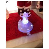 Battery operated merry go around with snowman and glass train, works great w/box