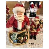 2 Santas with huge bag of toys made from heavy cloth
