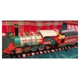 4 car train stationery on tracks that is a Christmas display only.