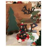 Wooden Christmas and wooden reindeer with decorated Christmas tree