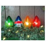 4 Jumbo Colored bulbs with 2 battery operated strands of garland–screwed to wall