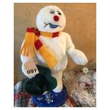 Frosty the Snowman lights up and dances and twirls his scarf and arm while singing