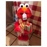 Vintage Elmo that has a sensor, moves, talks and sings Christmas songs w/box