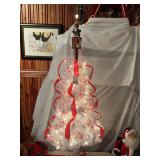 54 inch White lighted Christmas tree with a Vintage Mickey Mouse tree topper works great, goes up and down and lights up. With box.