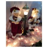 24-inch Mr. and Mrs. Santa with light pole lights up and moves