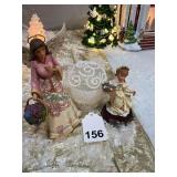 2 pristine angels and a beautiful frosted glass ornament in a glass cup