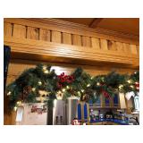 96 inch custom made garland with lights, pine cones and other decorations, very plush, really adds to a Christmas display, vintage