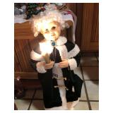 Vintage Mrs. Clause’s maid all dressed up for Santa’s ball, she moves and lights up