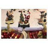 3 Cast Iron Mantel figurines and Stockings and large bells