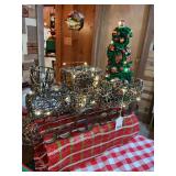 Old steam train made from wire that is lighted as a replica with tree with lights