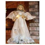 Lighted angel that plays Christmas music