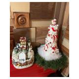 Electric village scene with small Christmas tree.