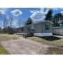Public Auction Secured Party Sale 22-56 2014 2BR Commodore Mobile Home 