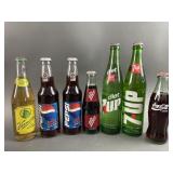 Vintage Coca-Cola, 7Up, Pepsi, & More Soda Bottles