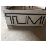 Tumi Store Sign