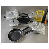 Handy Holder, Mirro Pans, Carvel Hall & More
