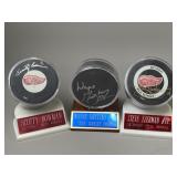 Signed Yzerman, Bowman & Gretzky Pucks
