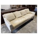 Cream Colored Tufted 2 Cushion Sofa