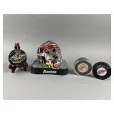 Signed Detroit Red Wings Pucks and Memorabilia