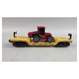 Lionel Depressed Flatcar with ERTL case 4w Tractor