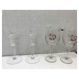 2 candle holders and 2 fox wine glasses