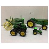 4 John Deere toy tractors