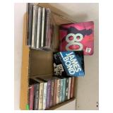Flat of cassette tapes and CDs