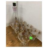 Gold leaf glasses and bottle