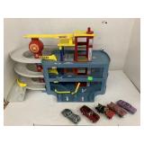 Matchbox Parking Garage and 5cnt Cars