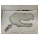 dinosaur-shaped LED neon sign. It is a decorative