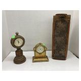 2 clocks and a wine bottle carrying box
