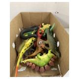 Box of dinosaurs and snakes