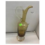 vintage amber glass decanter with a clear