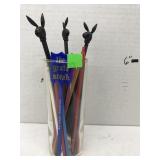 Glass with Cocktail Stir Sticks