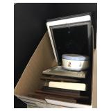 Box of frames and tin